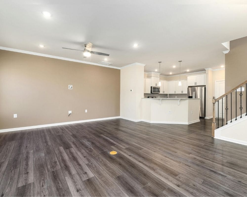 The same interior wall after painting, refreshed with a clean, modern finish